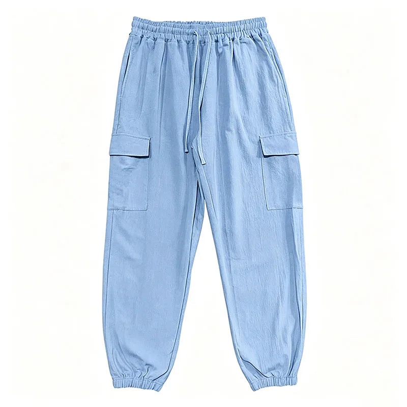 Pantalón Jogger cargo de algodón y lino con cintura elástica y múltiples bolsillos.