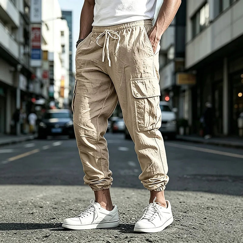 Pantalón Jogger cargo de algodón y lino con cintura elástica y múltiples bolsillos.