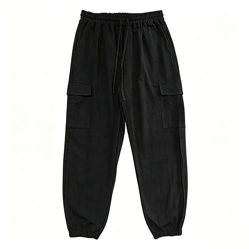 Pantalón Jogger cargo de algodón y lino con cintura elástica y múltiples bolsillos.