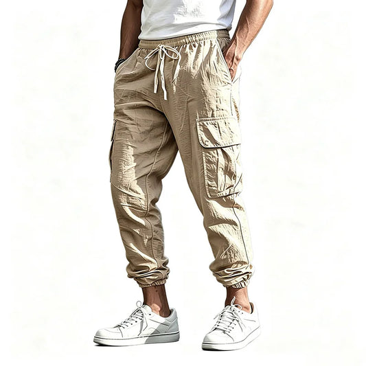 Pantalón Jogger cargo de algodón y lino con cintura elástica y múltiples bolsillos.