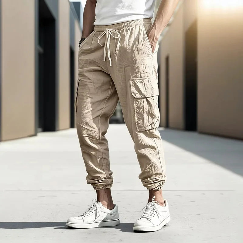 Pantalón Jogger cargo de algodón y lino con cintura elástica y múltiples bolsillos.