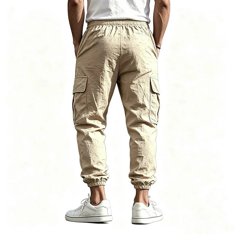 Pantalón Jogger cargo de algodón y lino con cintura elástica y múltiples bolsillos.