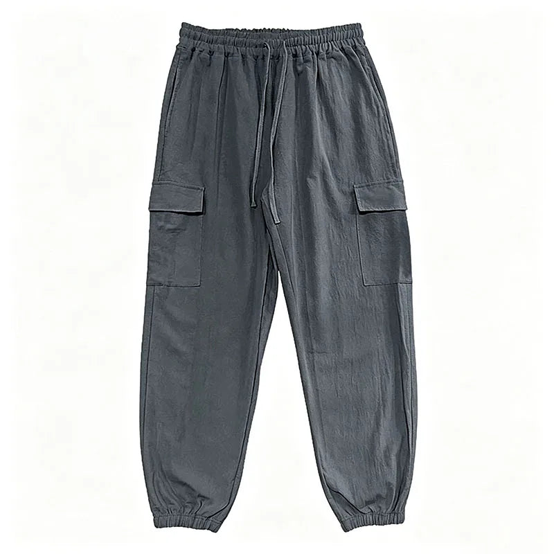 Pantalón Jogger cargo de algodón y lino con cintura elástica y múltiples bolsillos.